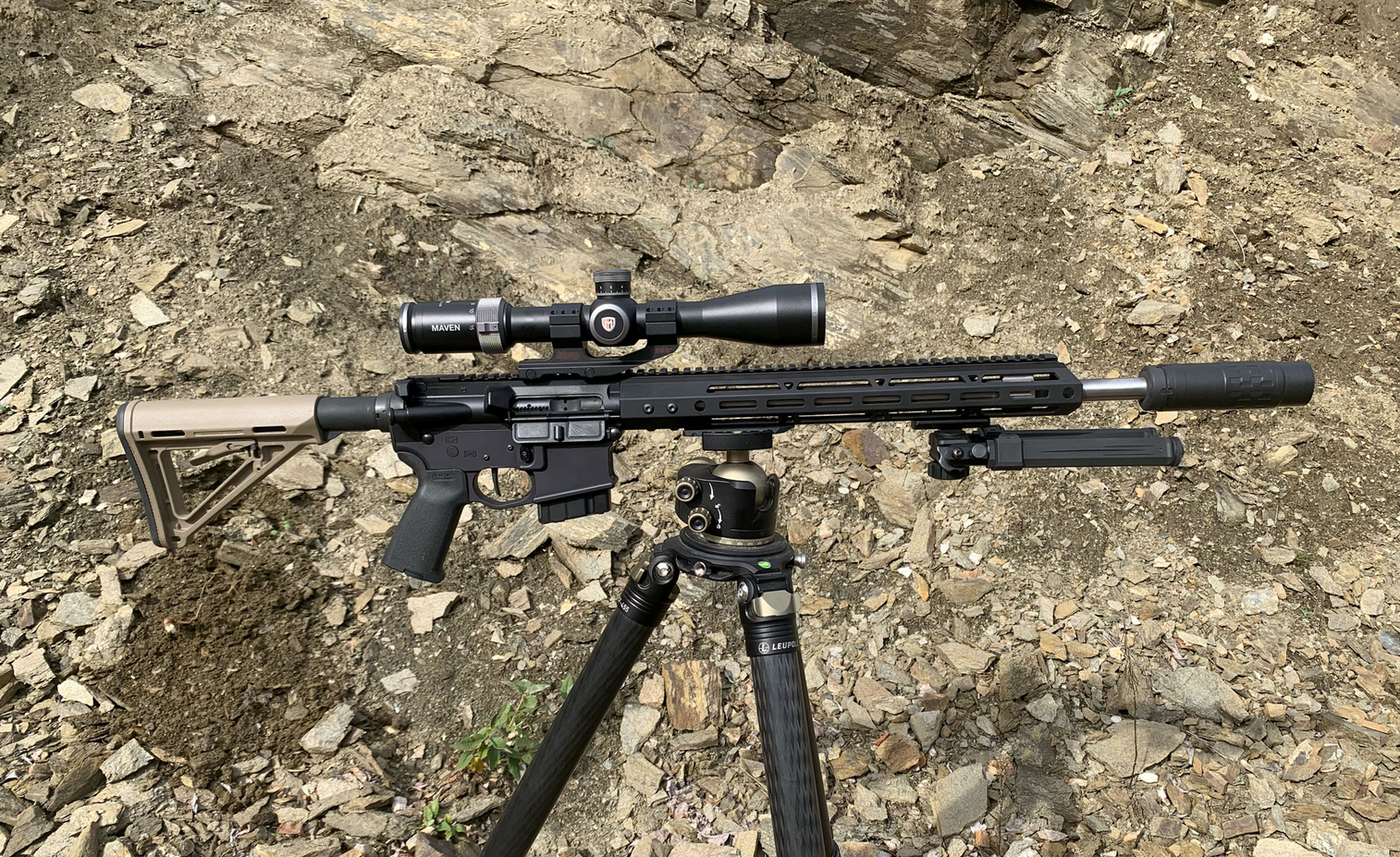 22 ARC Rifle Set up with suppressor on a tripod in the field